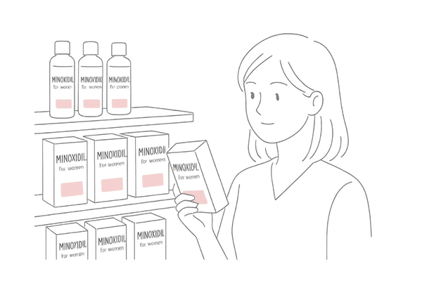 市販の発毛剤が並ぶドラッグストア棚イメージ