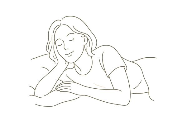 睡眠・リラックスをイメージした女性の姿